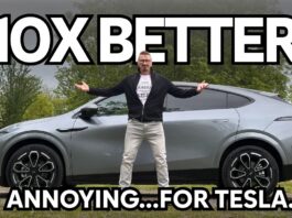 Man in a black jacket stands with arms outstretched in front of a gray Tesla SUV; bold text '10X BETTER' overlays the top and 'ANNOYING... FOR TESLA' at the bottom.